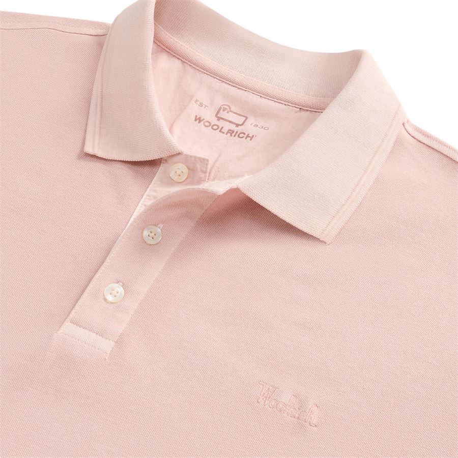 Polo Mackinack tinta in capo in piqué di cotone elasticizzato da uomo Woolrich | CFWOPO00654409